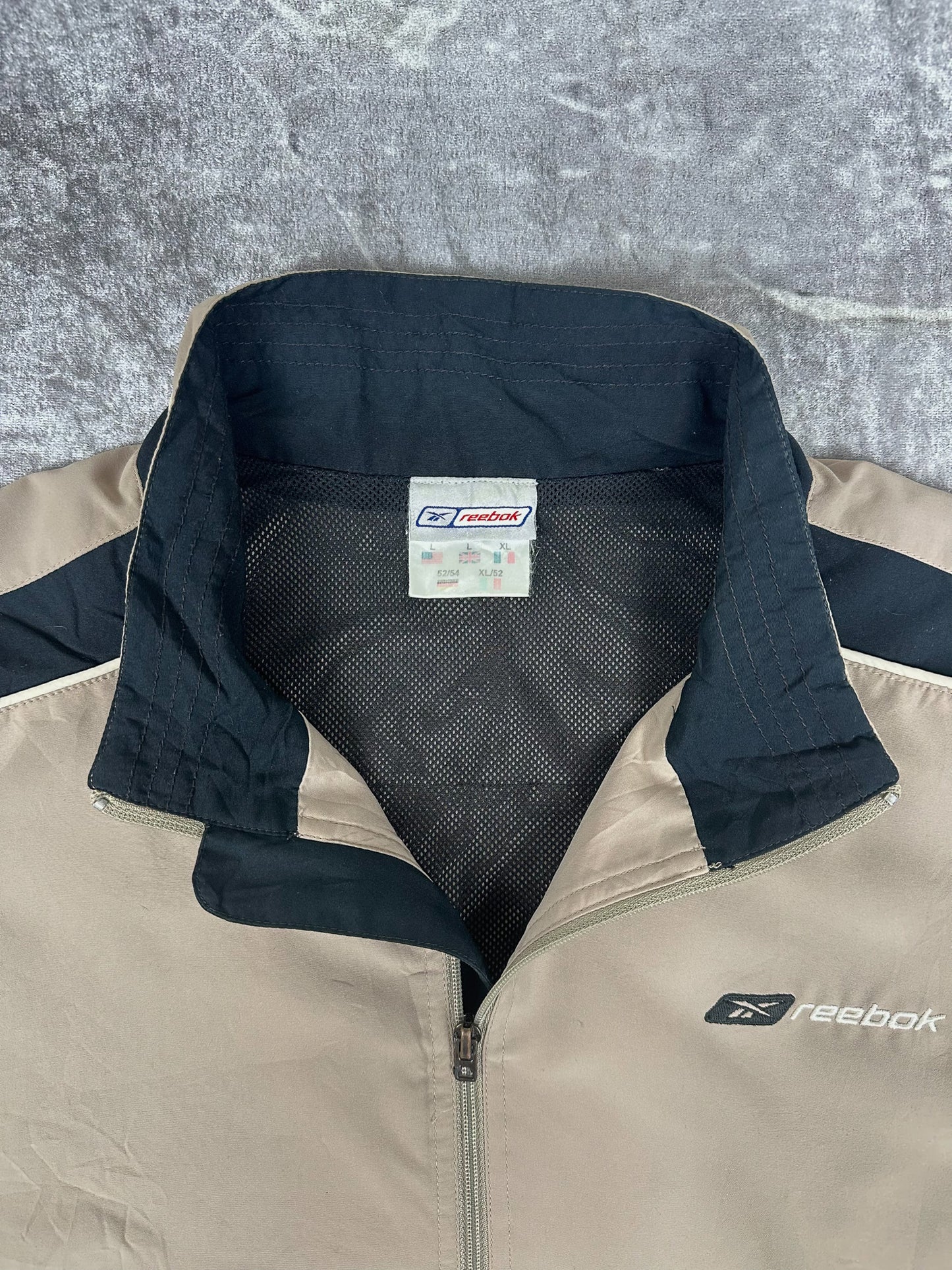 Vintage 00s Reebok Small Embroidered Logo Spellout Windbreaker Jacket (L)
