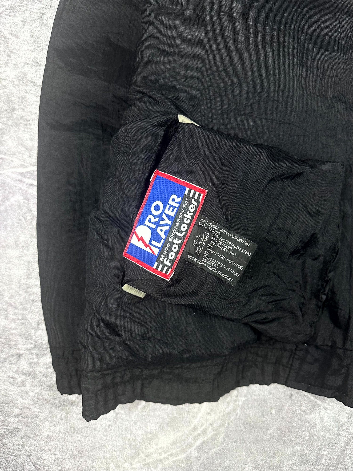 Vintage 90s Pro Player Oakland Raiders NFL Footlocker Exclusive Reversible Jacket (XL)