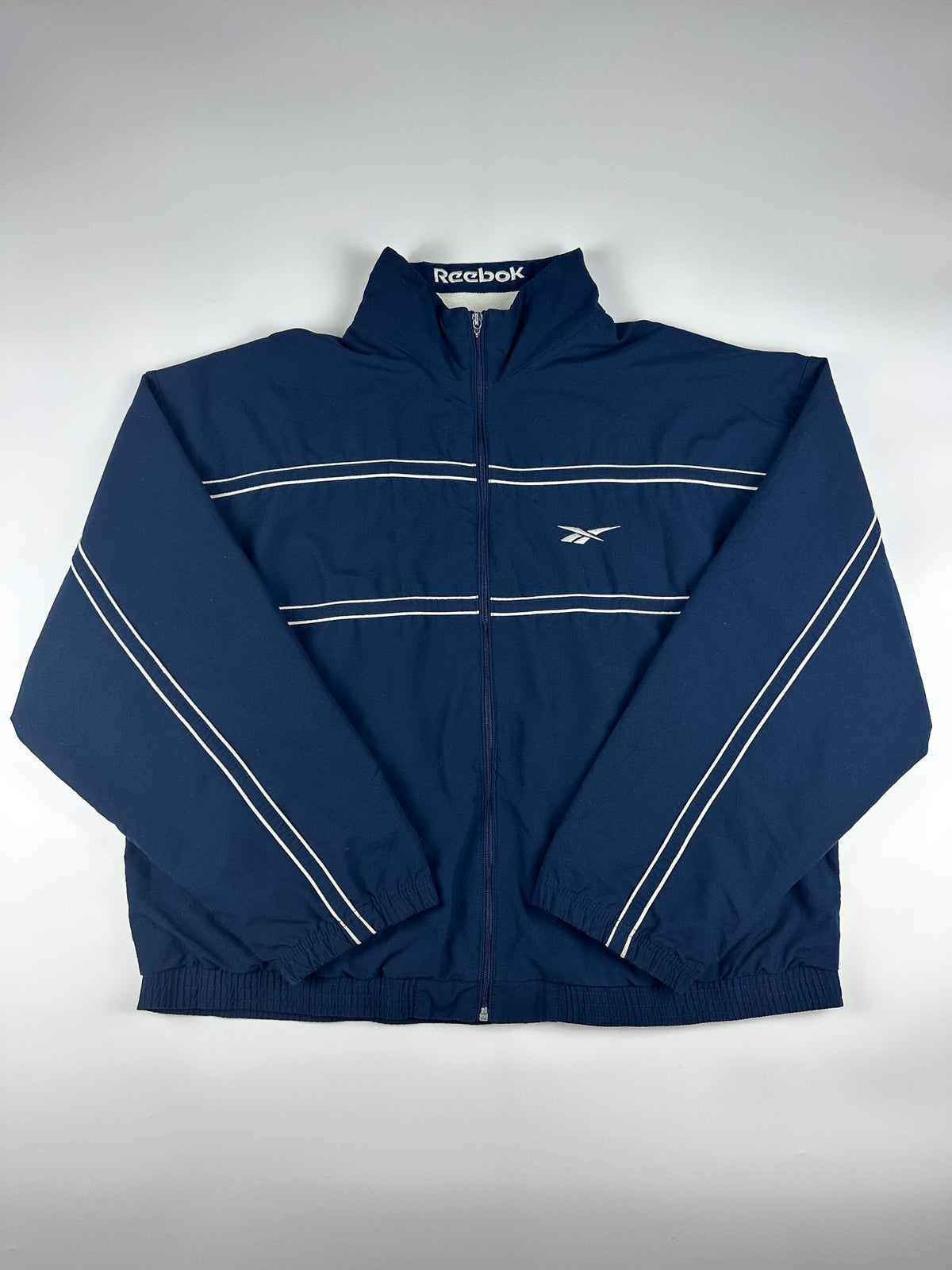 Vintage 90s Reebok Embroidered Logo Spellout Striped Windbreaker Jacket (XL)