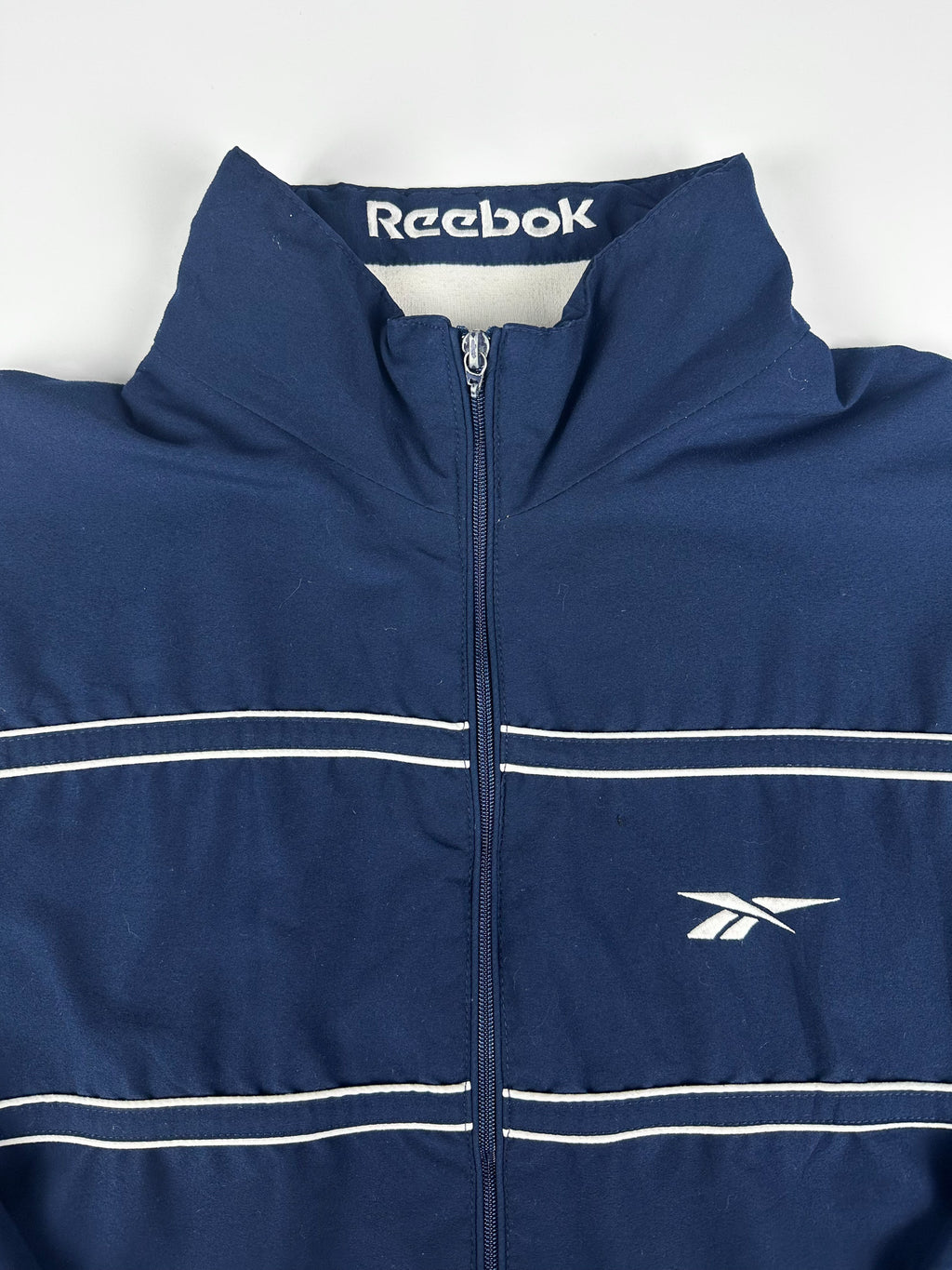 Vintage 90s Reebok Embroidered Logo Spellout Striped Windbreaker Jacket (XL)