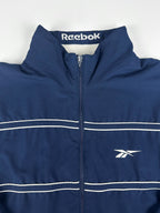 Vintage 90s Reebok Embroidered Logo Spellout Striped Windbreaker Jacket (XL)