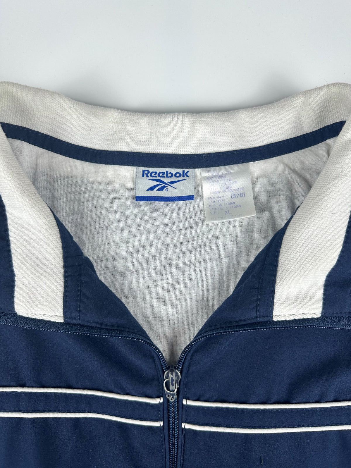 Vintage 90s Reebok Embroidered Logo Spellout Striped Windbreaker Jacket (XL)
