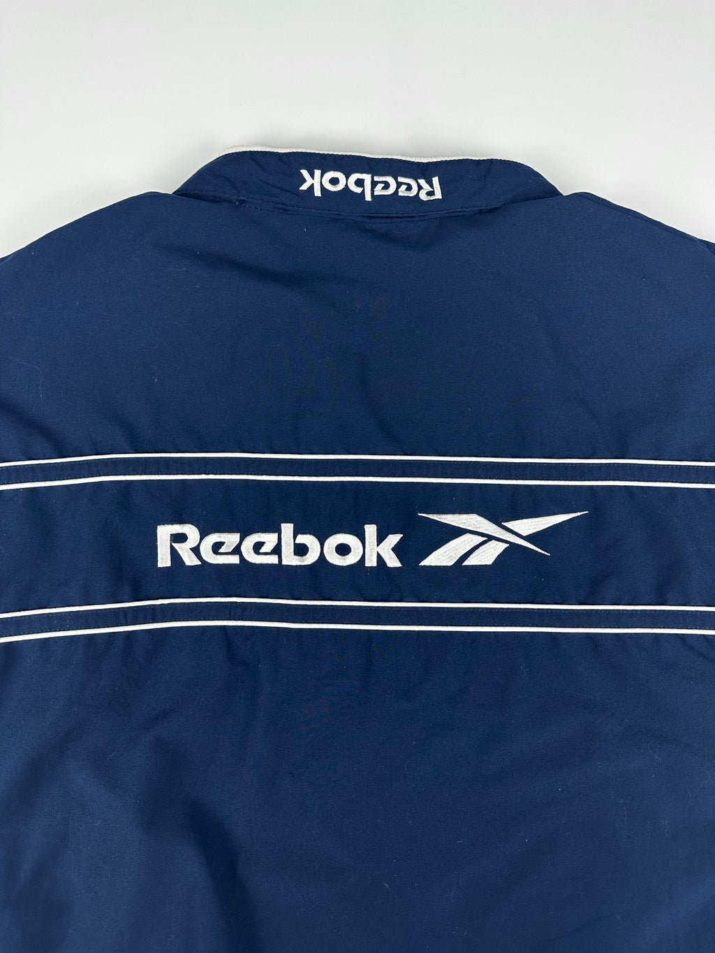 Vintage 90s Reebok Embroidered Logo Spellout Striped Windbreaker Jacket (XL)