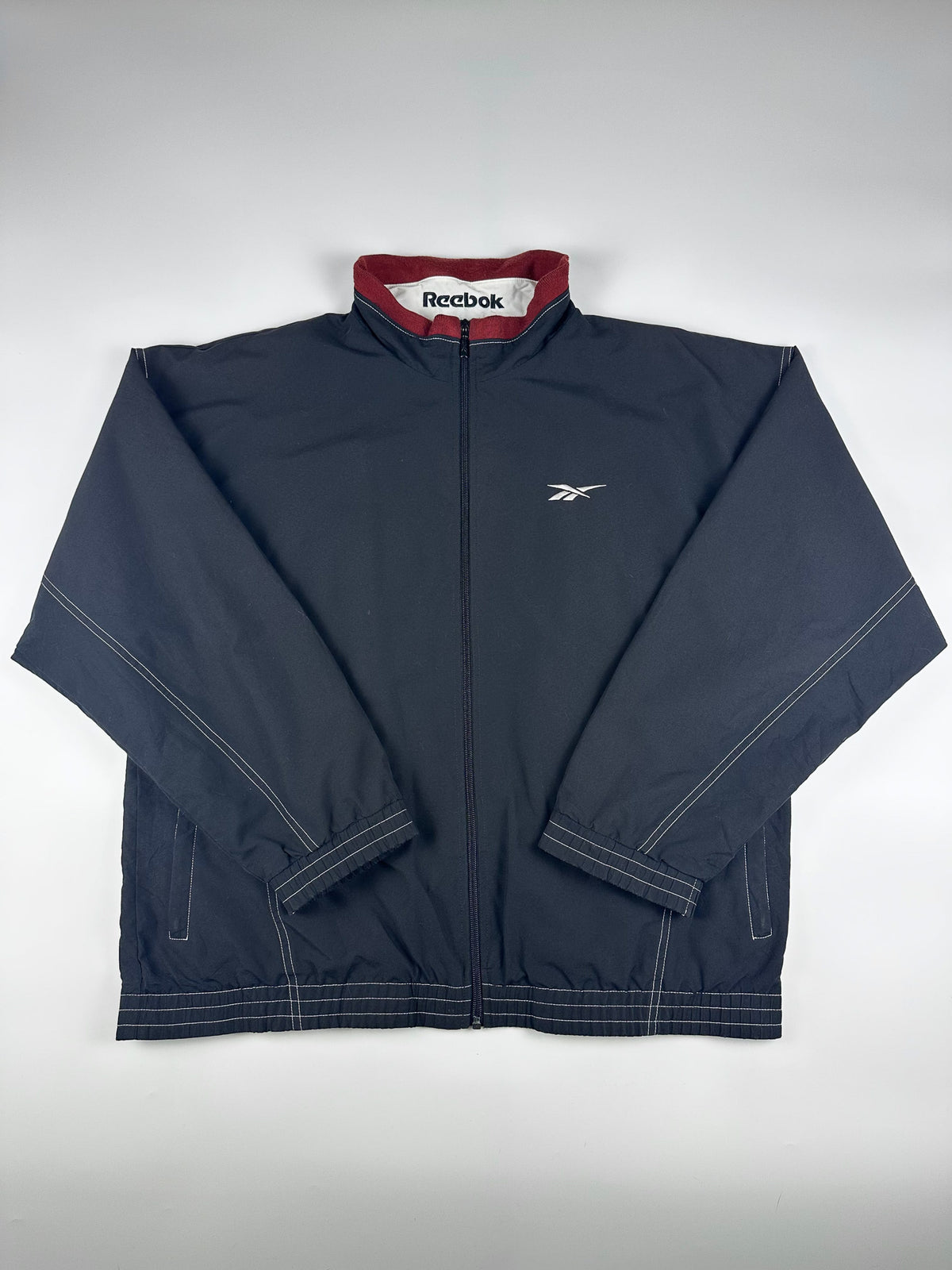 Vintage 90s Reebok Embroidered Logo Spellout Windbreaker Jacket (L)