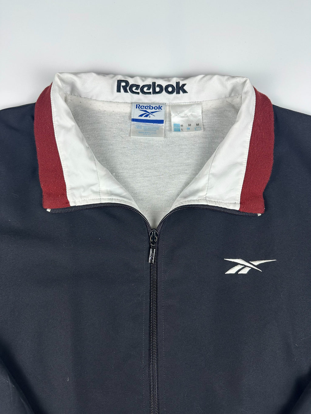 Vintage 90s Reebok Embroidered Logo Spellout Windbreaker Jacket (L)