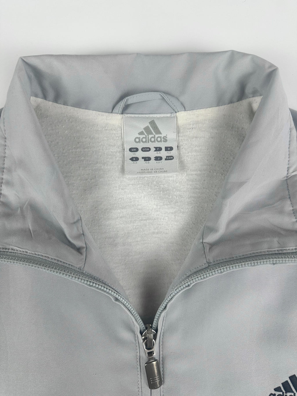 Vintage 00s 2002 Adidas Embroidered Mini Logo Windbreaker Jacket (L)