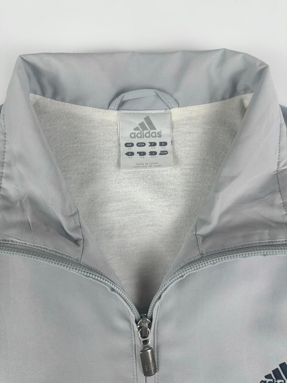Vintage 00s 2002 Adidas Embroidered Mini Logo Windbreaker Jacket (L)